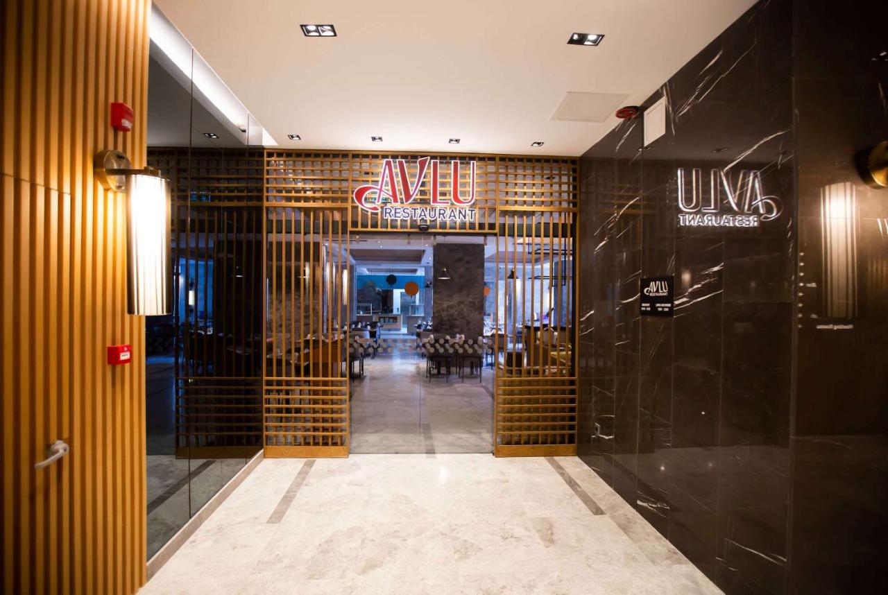 فندق Ramada Plaza Sultanahmet اسطنبول المظهر الخارجي الصورة Entrance to AVLI